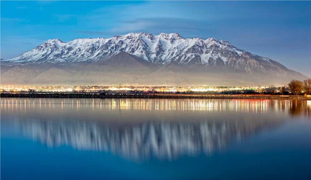 Utah Lake with Mount Timpanogos in the background at dusk